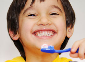 Fun Ways to Get Kids to Brush Their Teeth - Blog - Sparkle Dental - kid-brushing-teeth